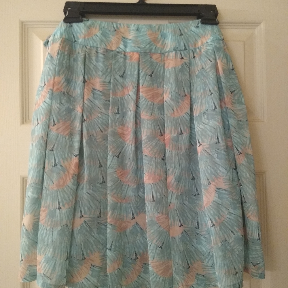 Pretty, soft green, pleated skirt